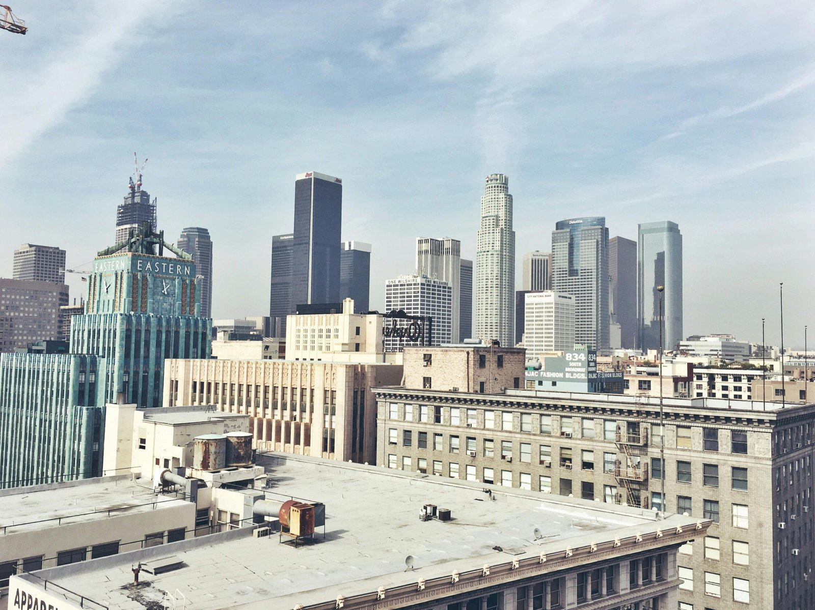 flights from London to Los Angeles, A breathtaking view of Los Angeles skyscrapers under a clear sky.